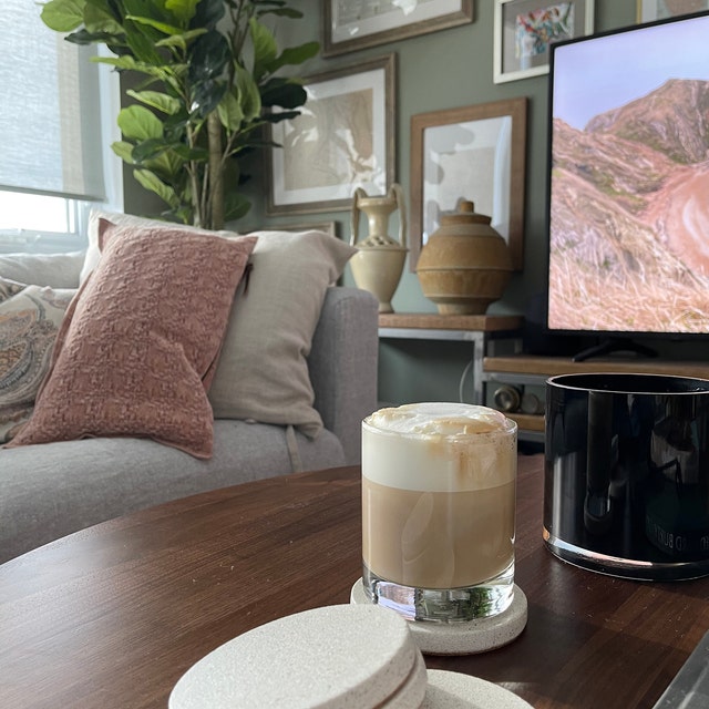 White Concrete Coaster Set on Wooden Coffee Table - Elegant Living Space Accessory for Modern Home Deco