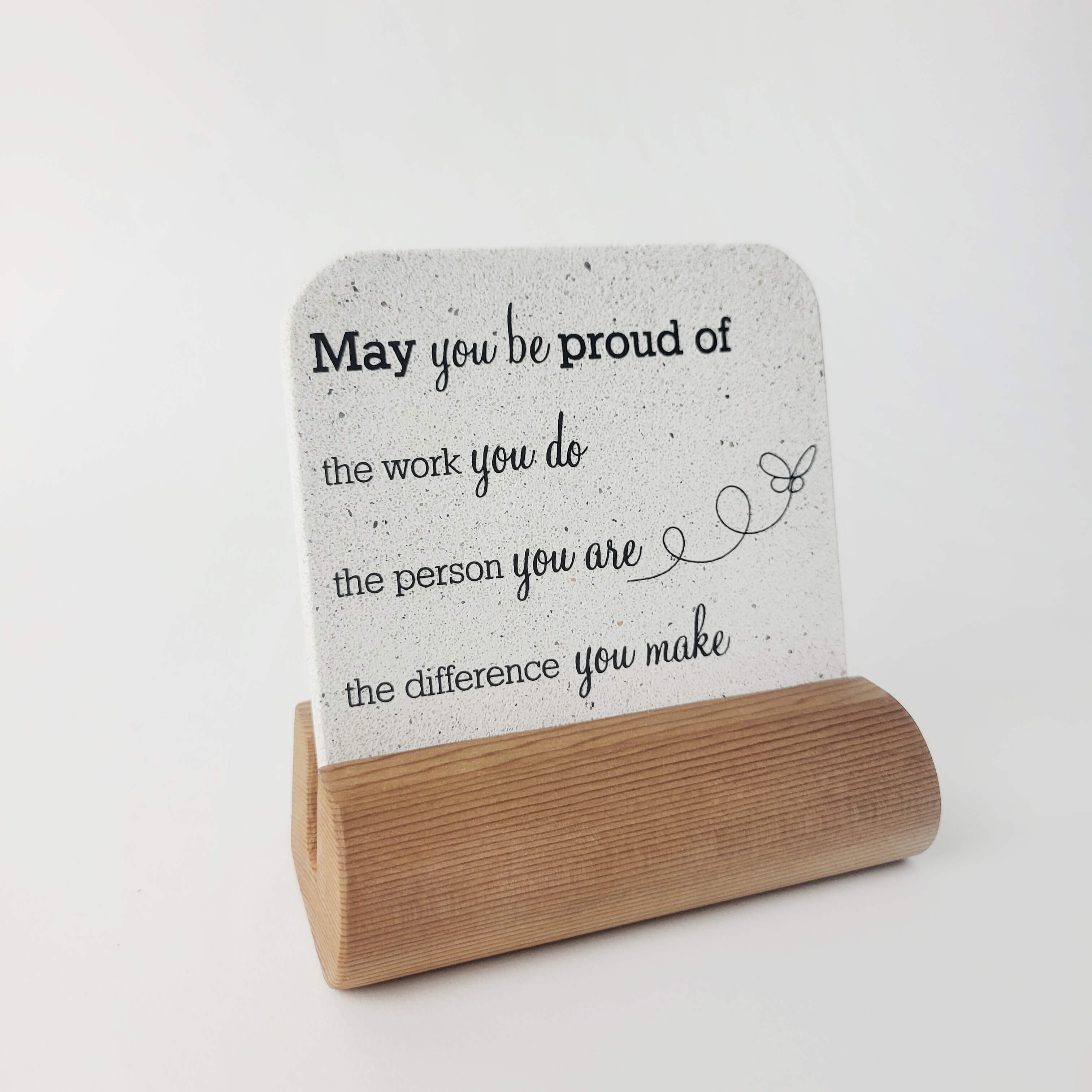 White stone motivational mini display 'May you be proud' on upcycled western red-cedar base for home and office desks.