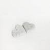 Two sparkling white sandstone hearts displayed side by side with a white background.