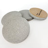 Four grey sandstone stone beverage,  drink coasters with a cork bottom - Made in Winnipeg, Manitoba, Canada by Canadian HandCrafted